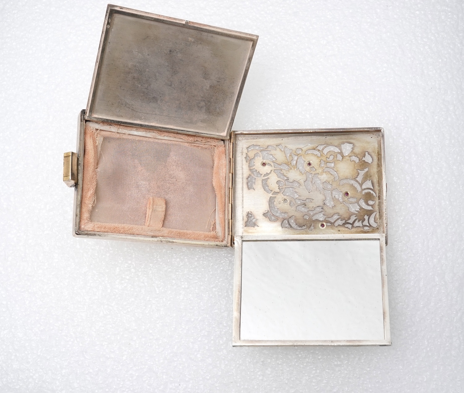 Boucheron, a silver gilt and ruby vanity case, France, 1940s